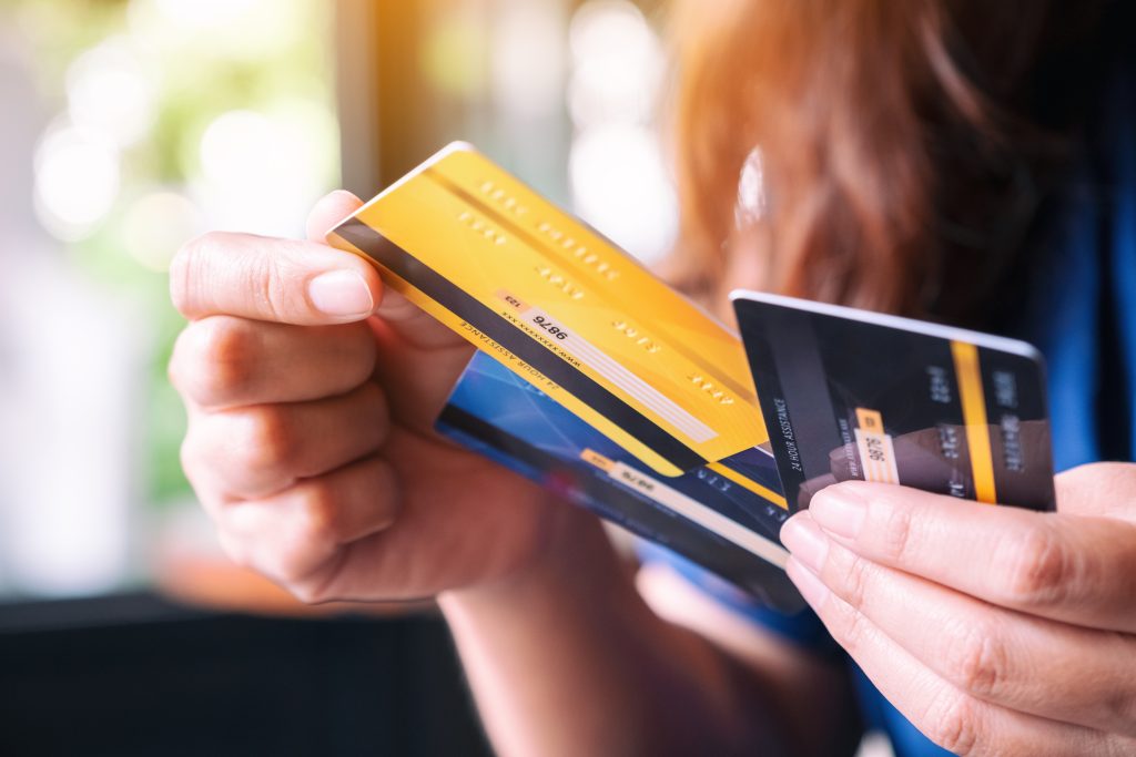 How can immigrants build credit from scratch in the U.S.?